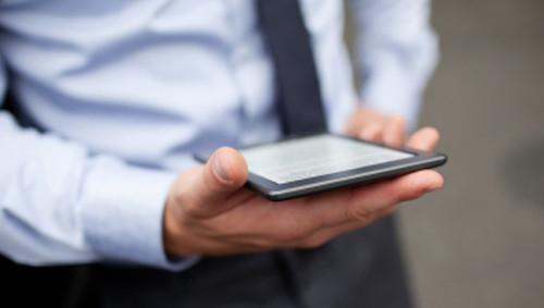 Businessman reading ebook